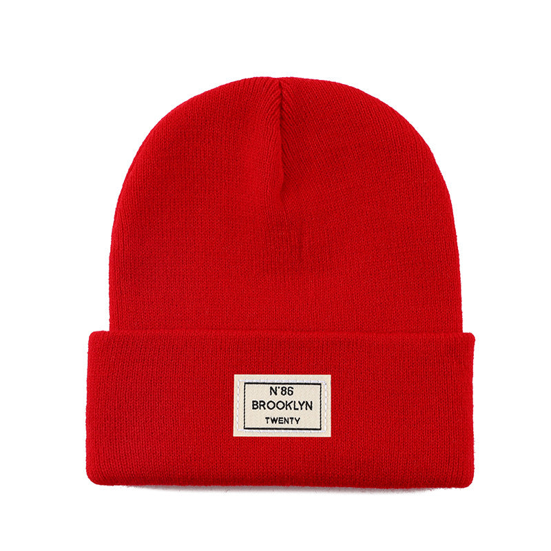 Knitted Beanie With Brand Label Stylish And Fashionable
