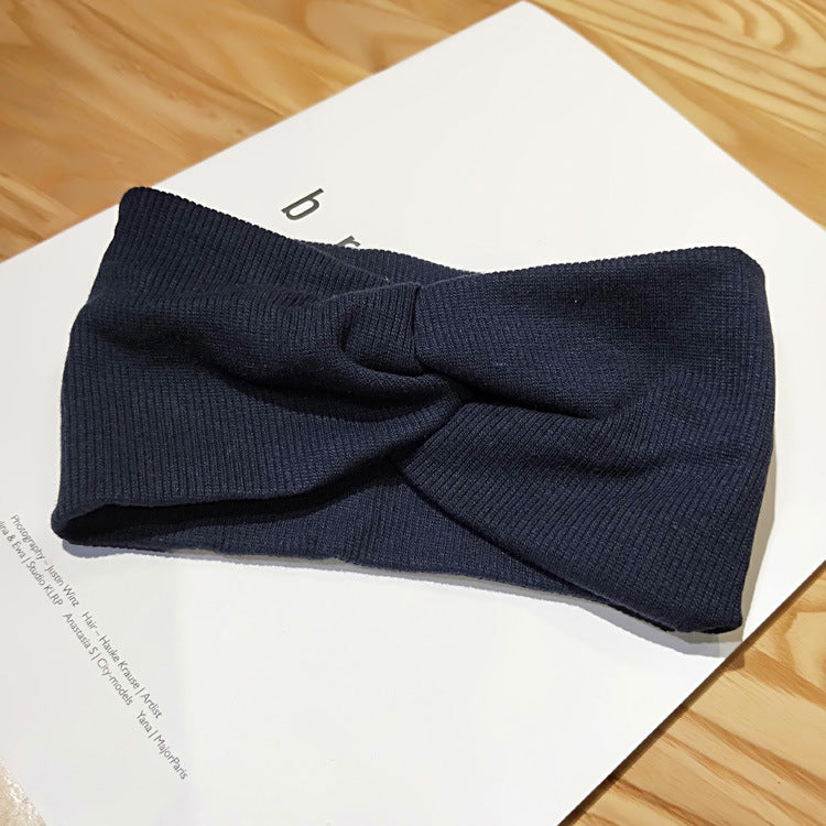 Wide side stretch knitted headband