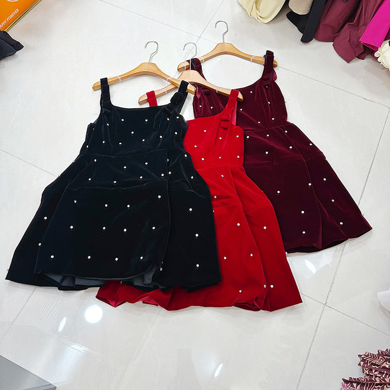 Fitted Black Dress With A Puffy Mini Skirt
