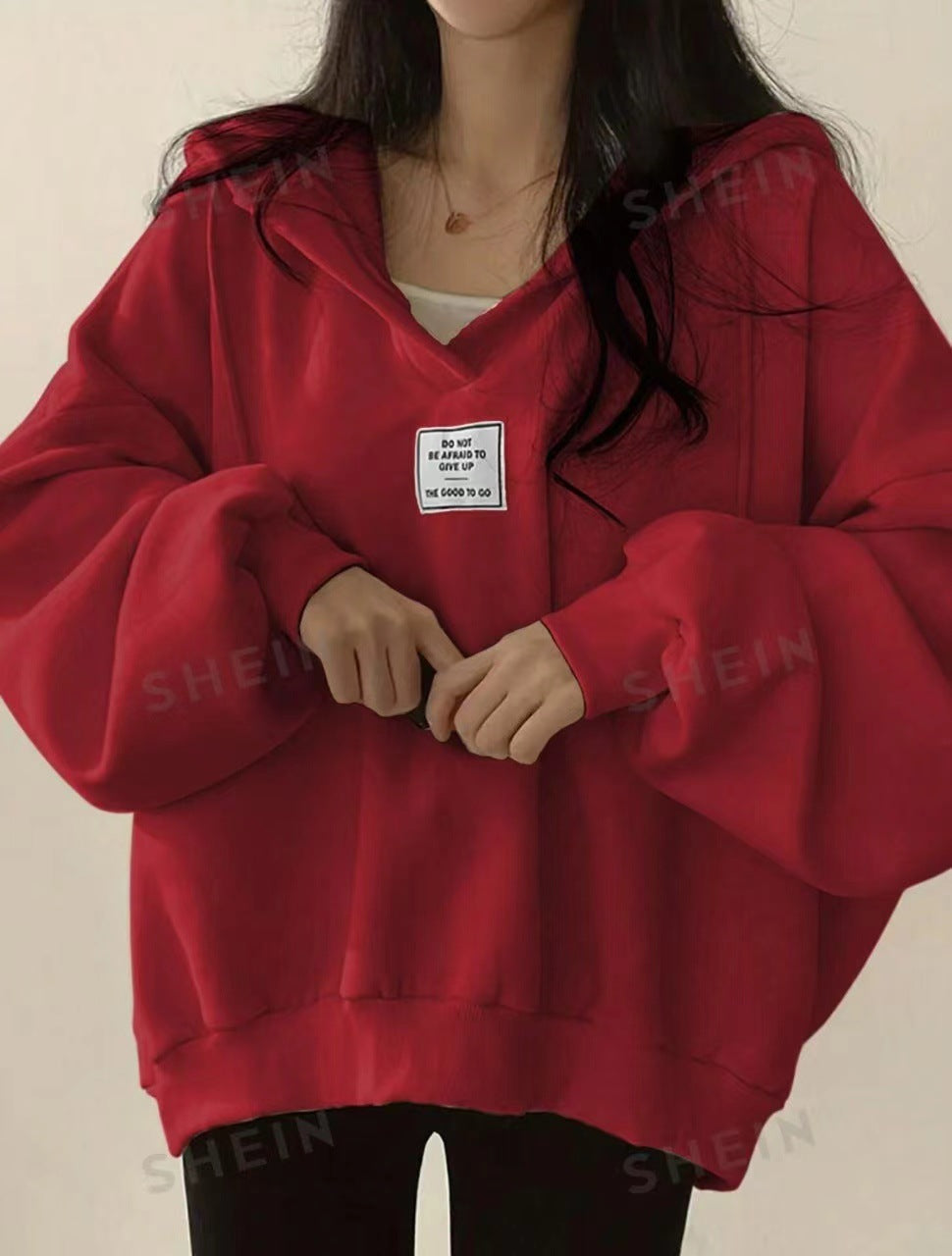 Løstsiddende alsidig sweatshirt med hætte og V-hals til kvinder