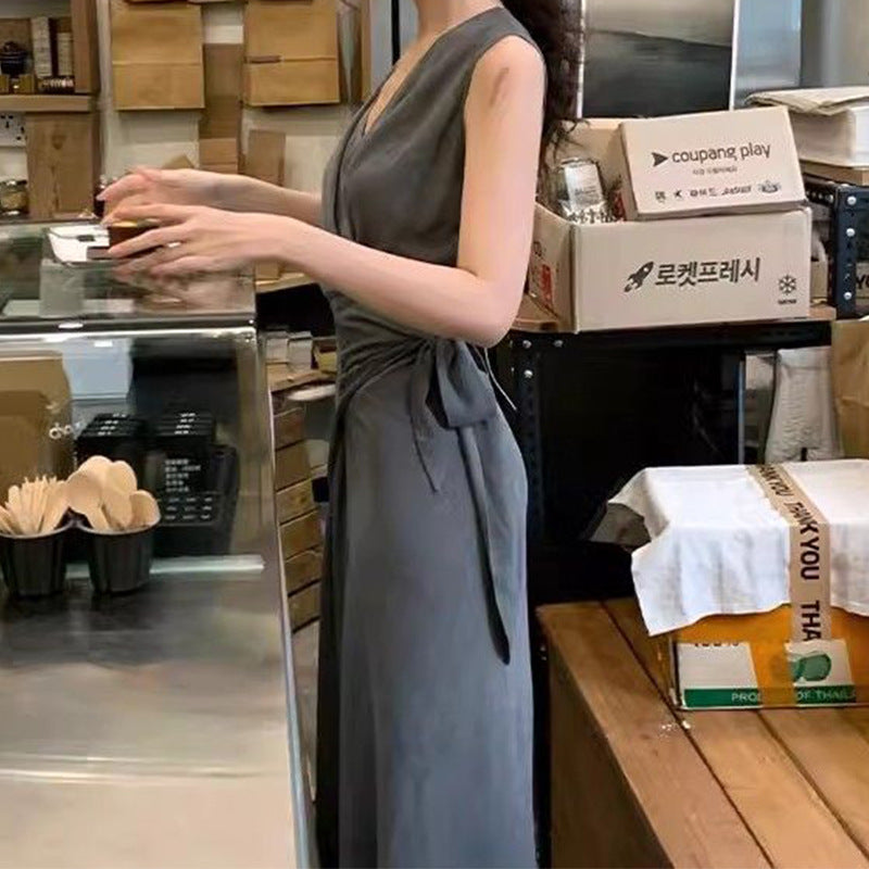 Overlap Neck Wrap Style Sleeveless Dress With A Soft Flowing Drape