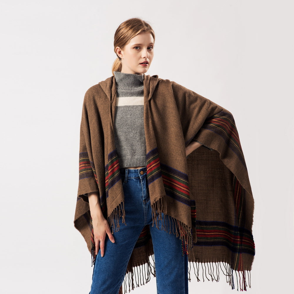 Keep warm by adding a stylish hooded cape
