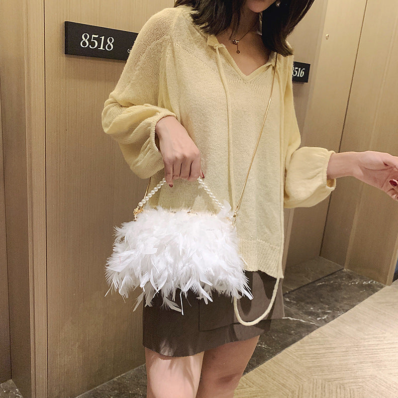 Ostrich hair clip buckle pearl diagonal bag