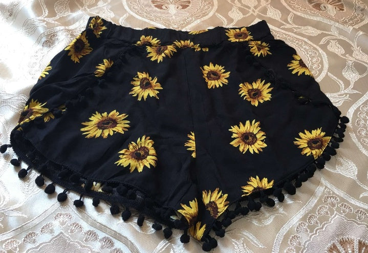 Europæisk og amerikansk udenrigshandel, sommernyhed, dame shorts med pomponer og solsikkeprint, elastisk talje, strandshorts
