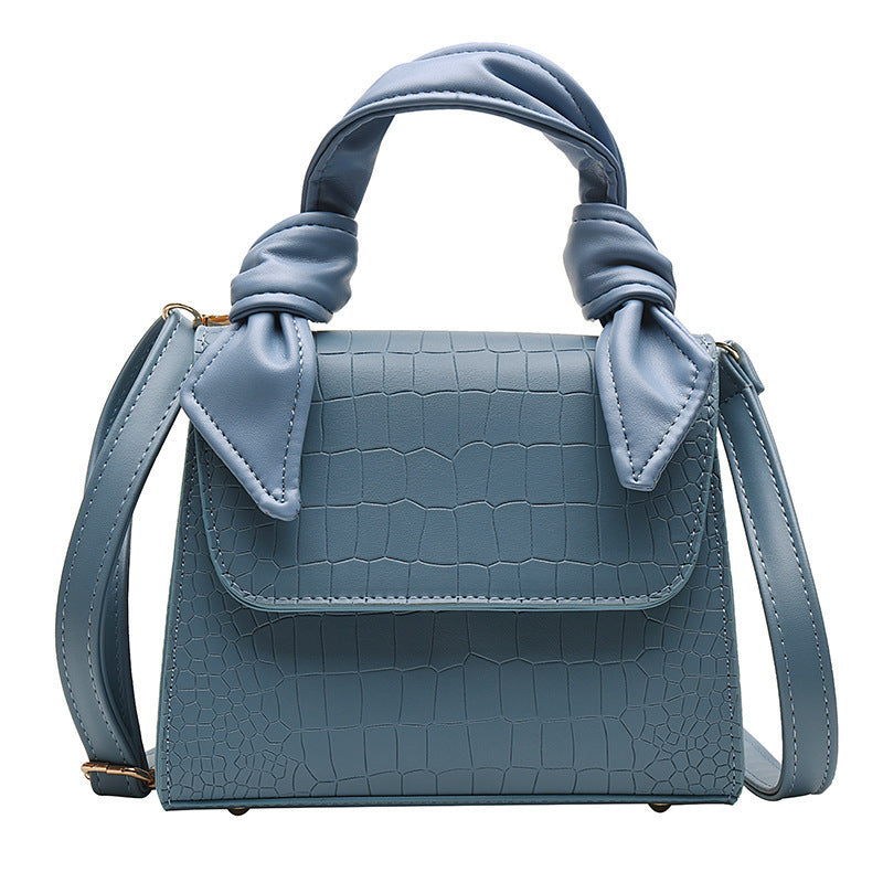 Stone-grained shoulder-slung crossbody bag