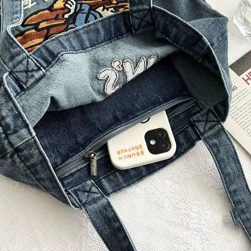 Skuldertaske i kunststof med vintagelook og vask