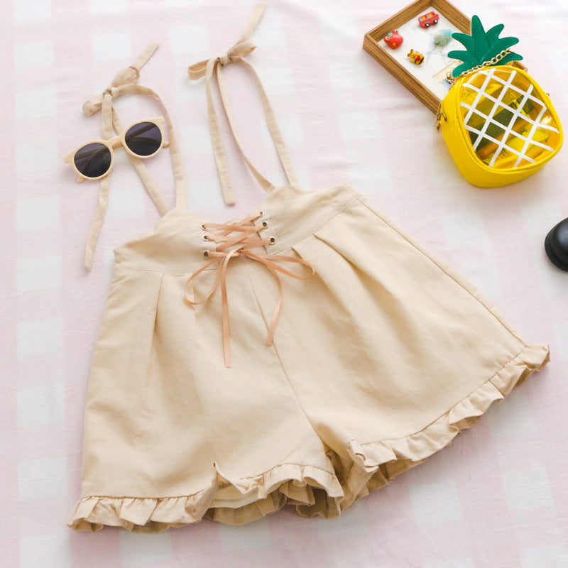 Bow-tied flounces with suspenders