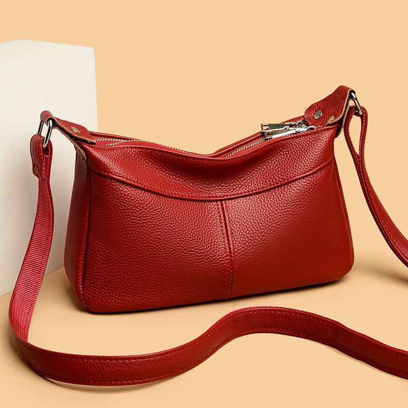 Multi-compartment Shoulder Messenger Bag Women's Large Capacity Cowhide New Moon Bag