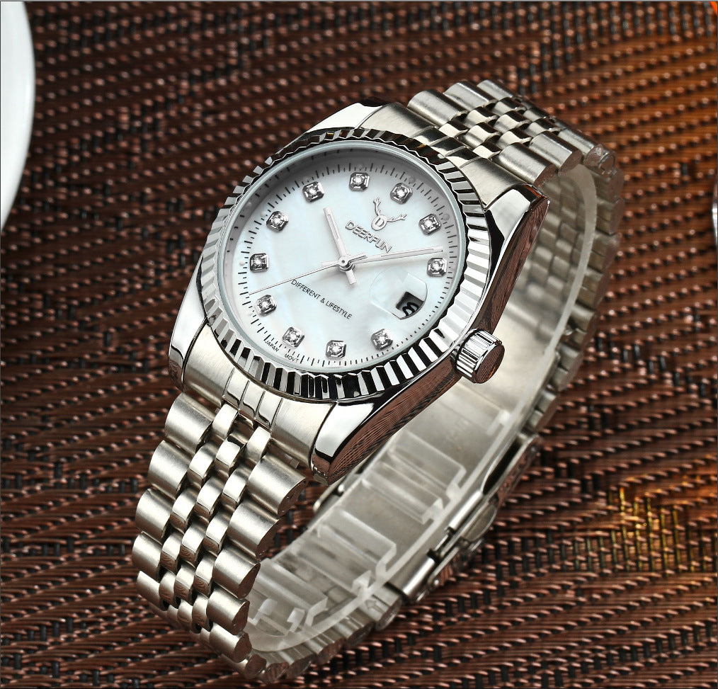 Shell watch with diamonds