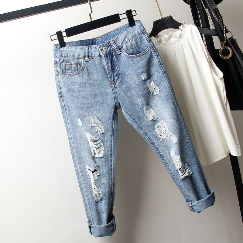 Oversized women's ripped jeans