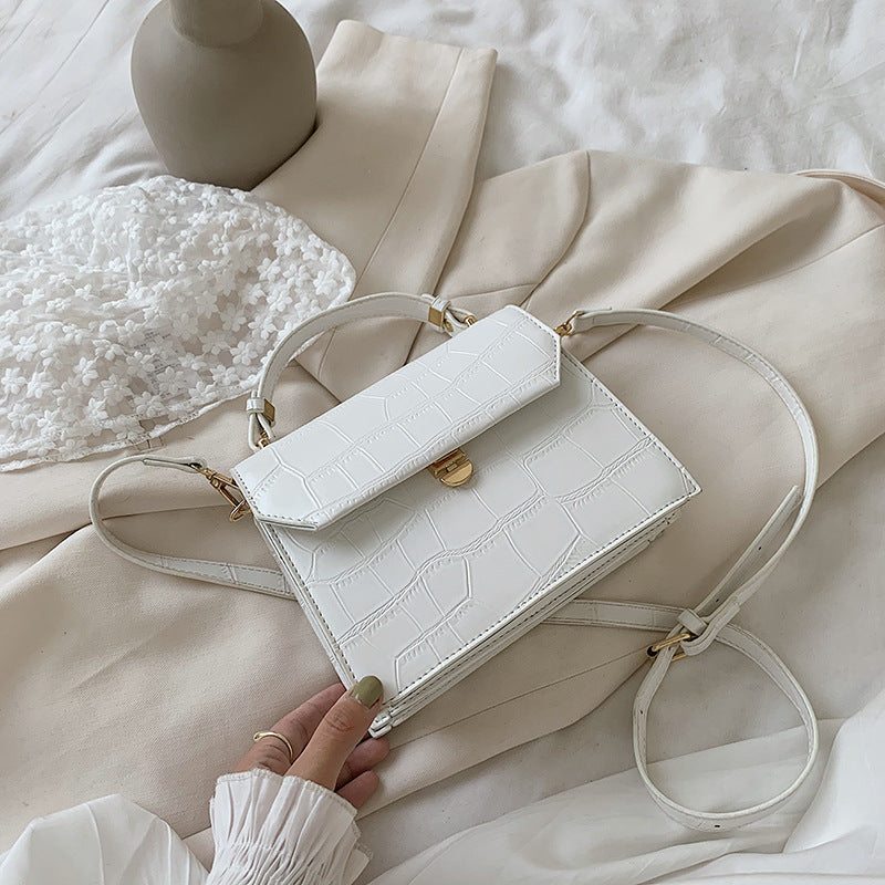 Stone embossed crossbody bag