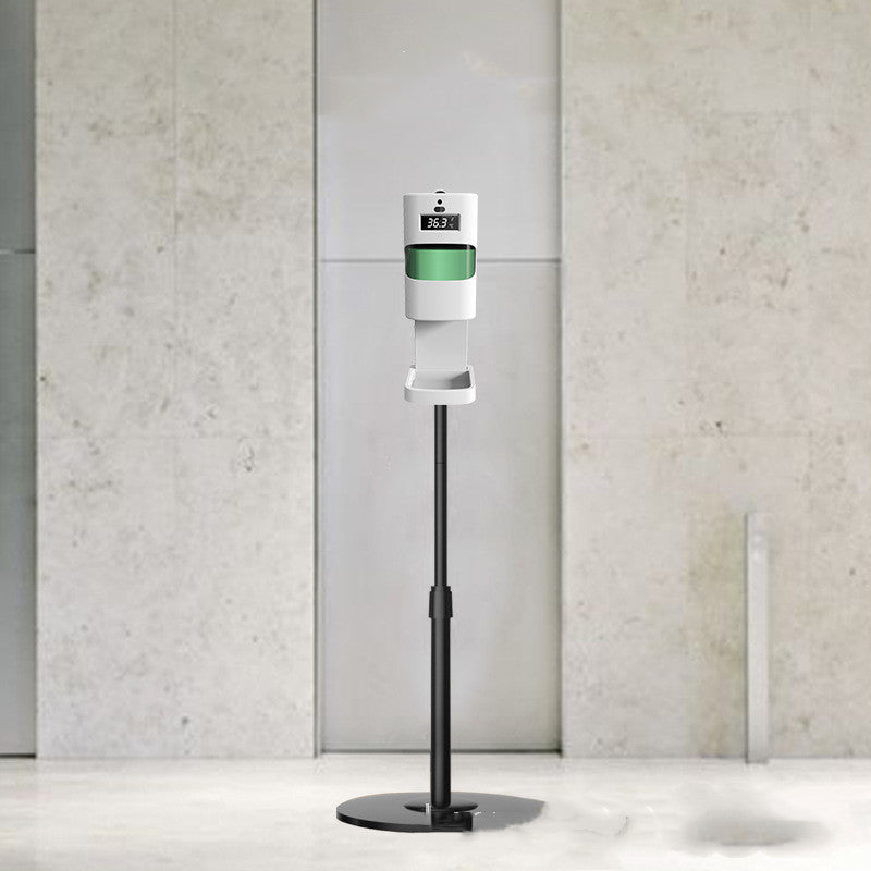 Hand washing machine with soap dispenser