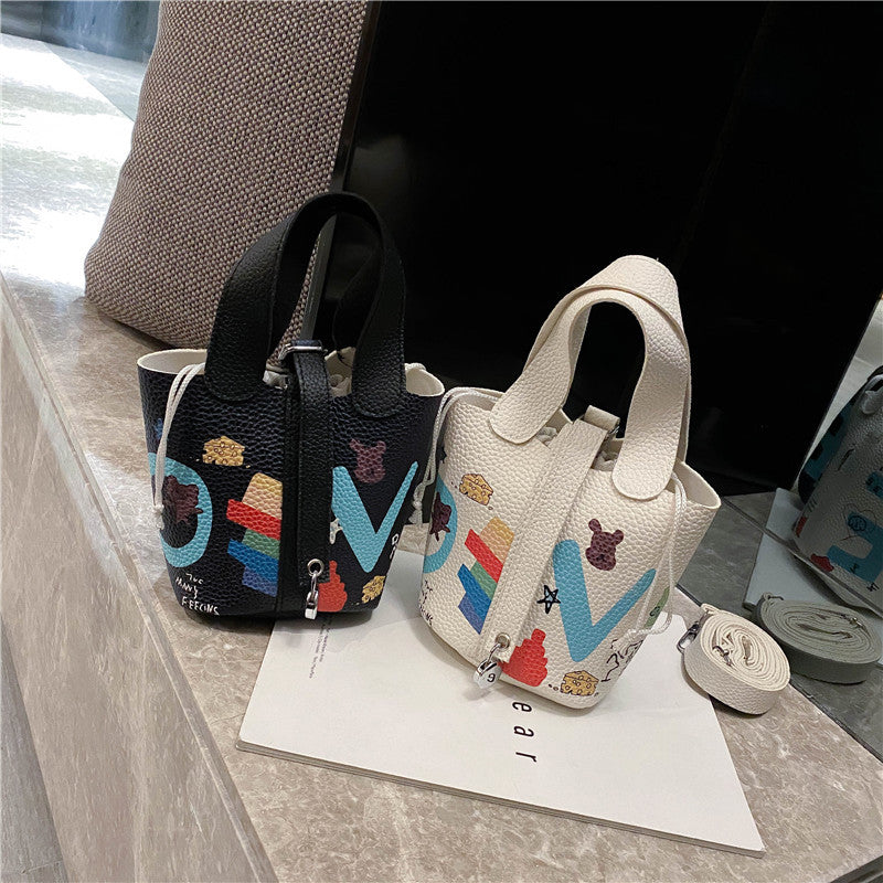 Female cartoon doodle diagonal bag