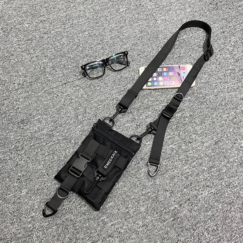 Mobile phone belt bag with belt buckle