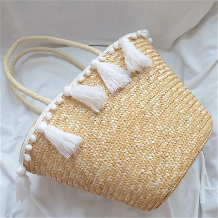 Female hand-woven tassel shoulder bag