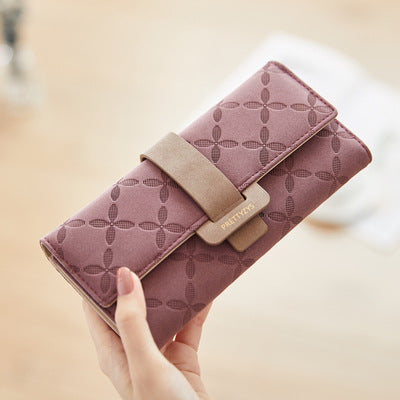 Three-fold wallet with belt buckle