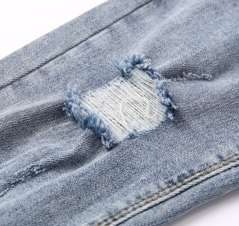 Lyseblå Ripped Jeans Til Kvinder Tynde Og Lange Ni-punkts Pencil Benbukser