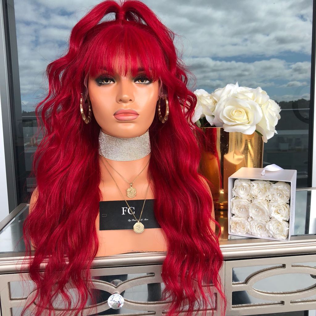 A big wavy red wig