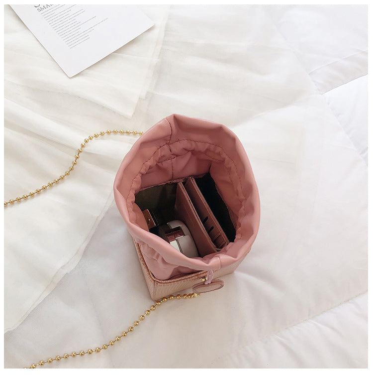 Chain drawstring crossbody bag