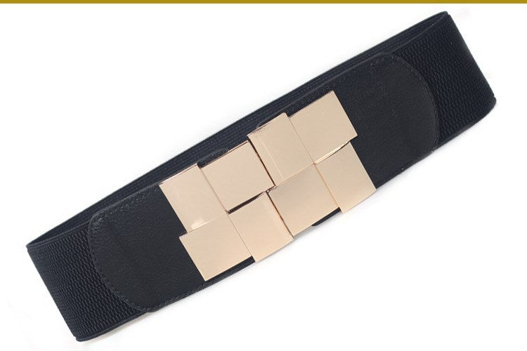 The lady's loose skirt has a wide belt