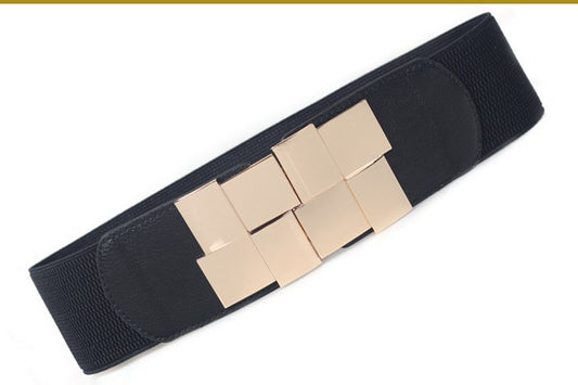 The lady's loose skirt has a wide belt