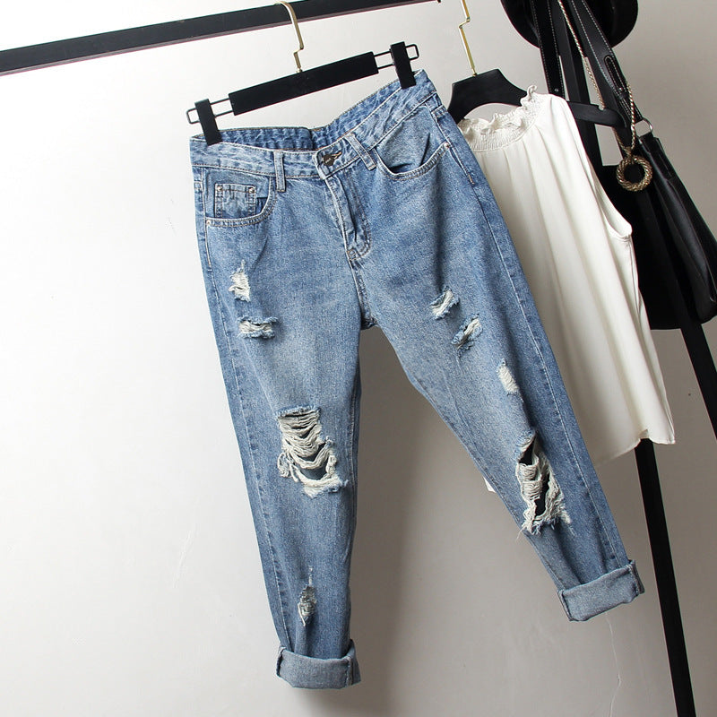Oversized women's ripped jeans