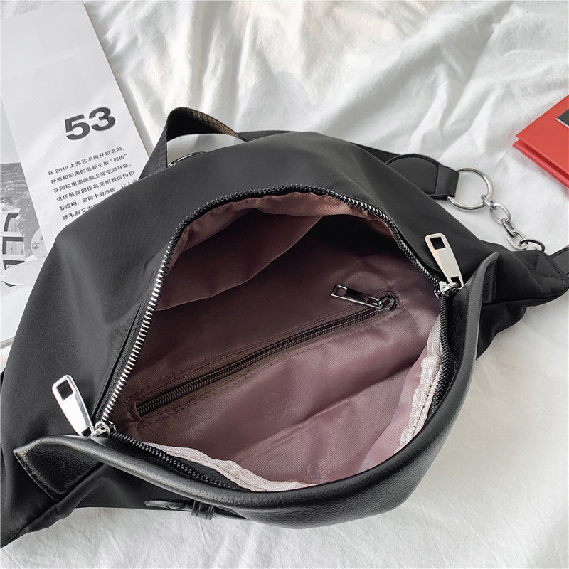 Brysttaske i nylon med smart kæde og dobbelt funktion