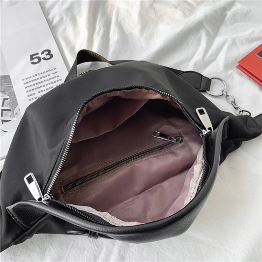 Brysttaske i nylon med smart kæde og dobbelt funktion