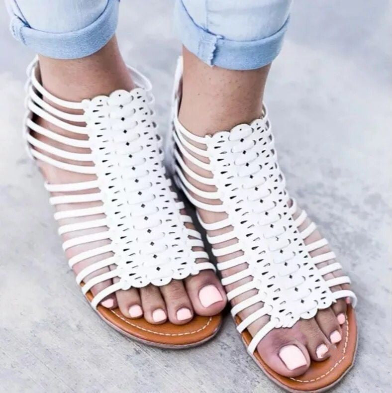 Openwork Roman sandals with flat sole