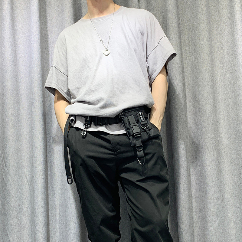 Mobile phone belt bag with belt buckle