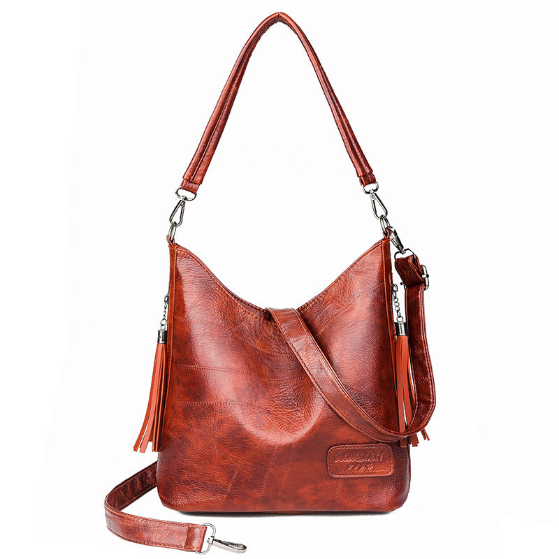 Simple fashion tassel female bag