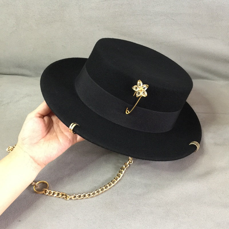 Female retro black top hat