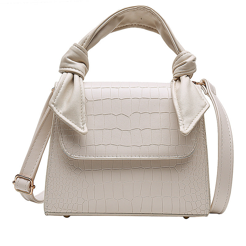 Stone-grained shoulder-slung crossbody bag