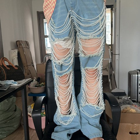 Kvinders kreative afslappede perlekædejeans