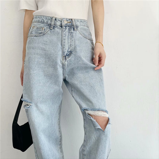 Women's ripped jeans are thin and loose in summer