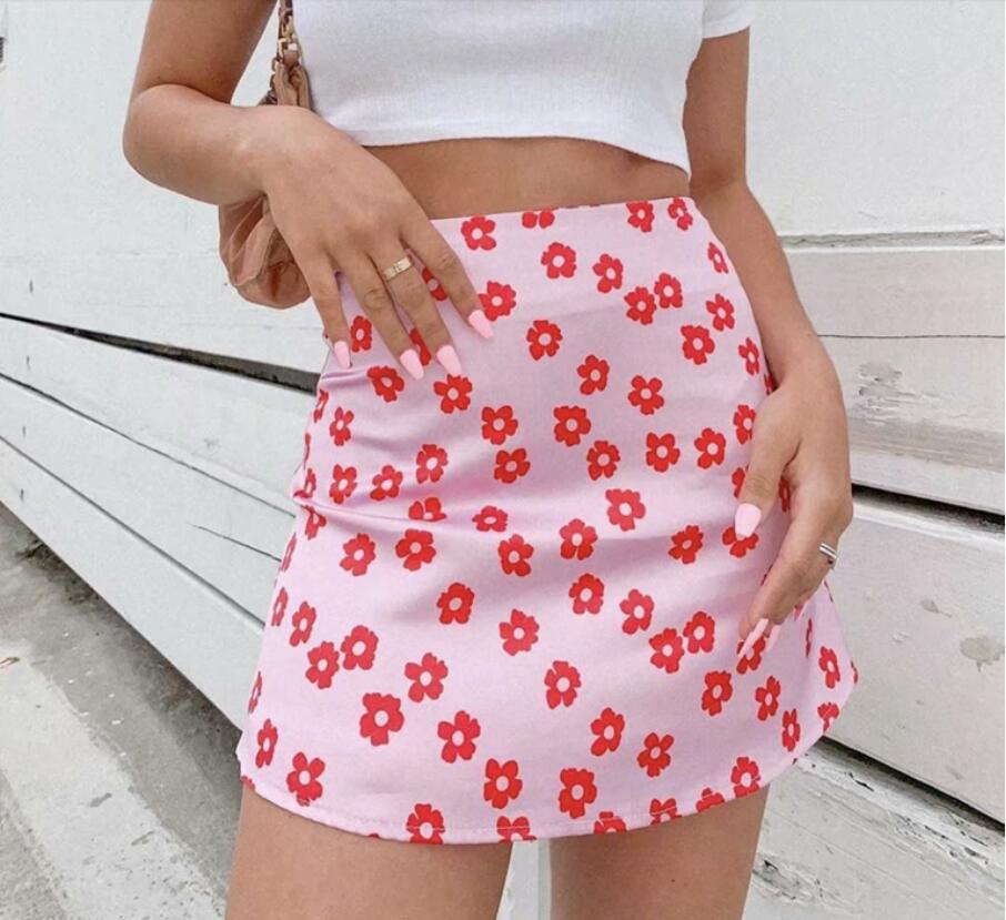 Street Hipsters With The Same Skirt Female
