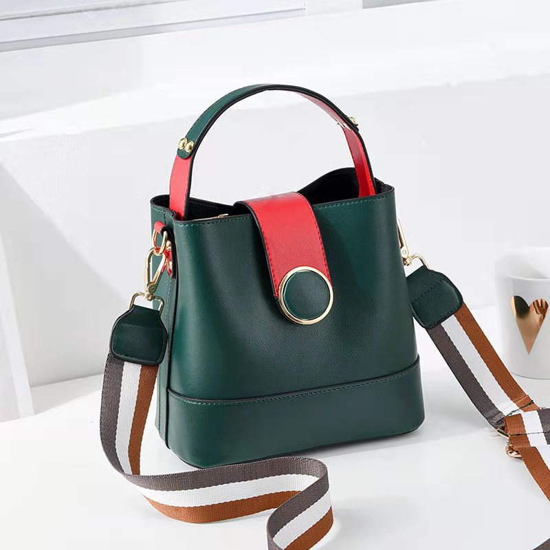 New fashion trend women's bag handbag Korean version large capacity bucket bag retro broadband One Shoulder Messenger Bag