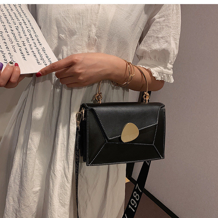 Crossbody-tasker i læder med kontrastfarver