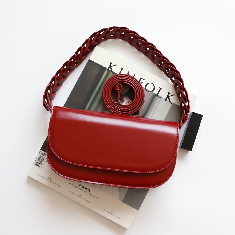 Summer New Twist Hollow Woven Leather Stick Bag Armpit Bag Simple Crossbody Leather Bag