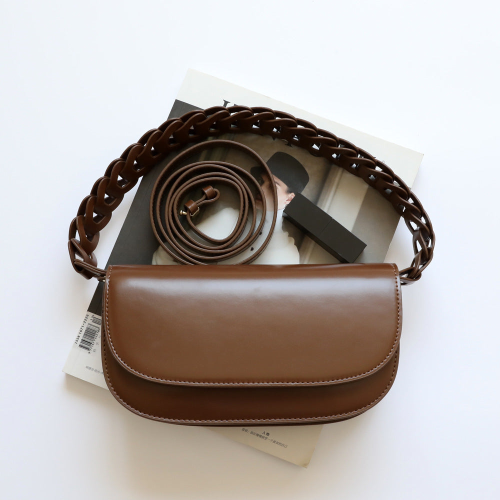 Summer New Twist Hollow Woven Leather Stick Bag Armpit Bag Simple Crossbody Leather Bag