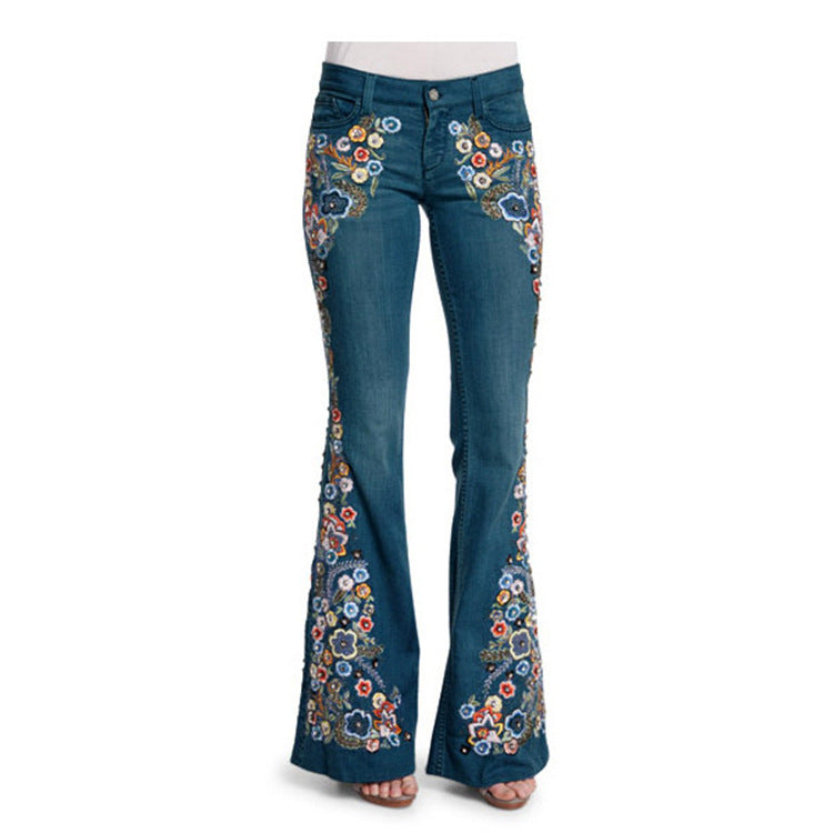 Broderede slim-flared-bukser i vasket denim