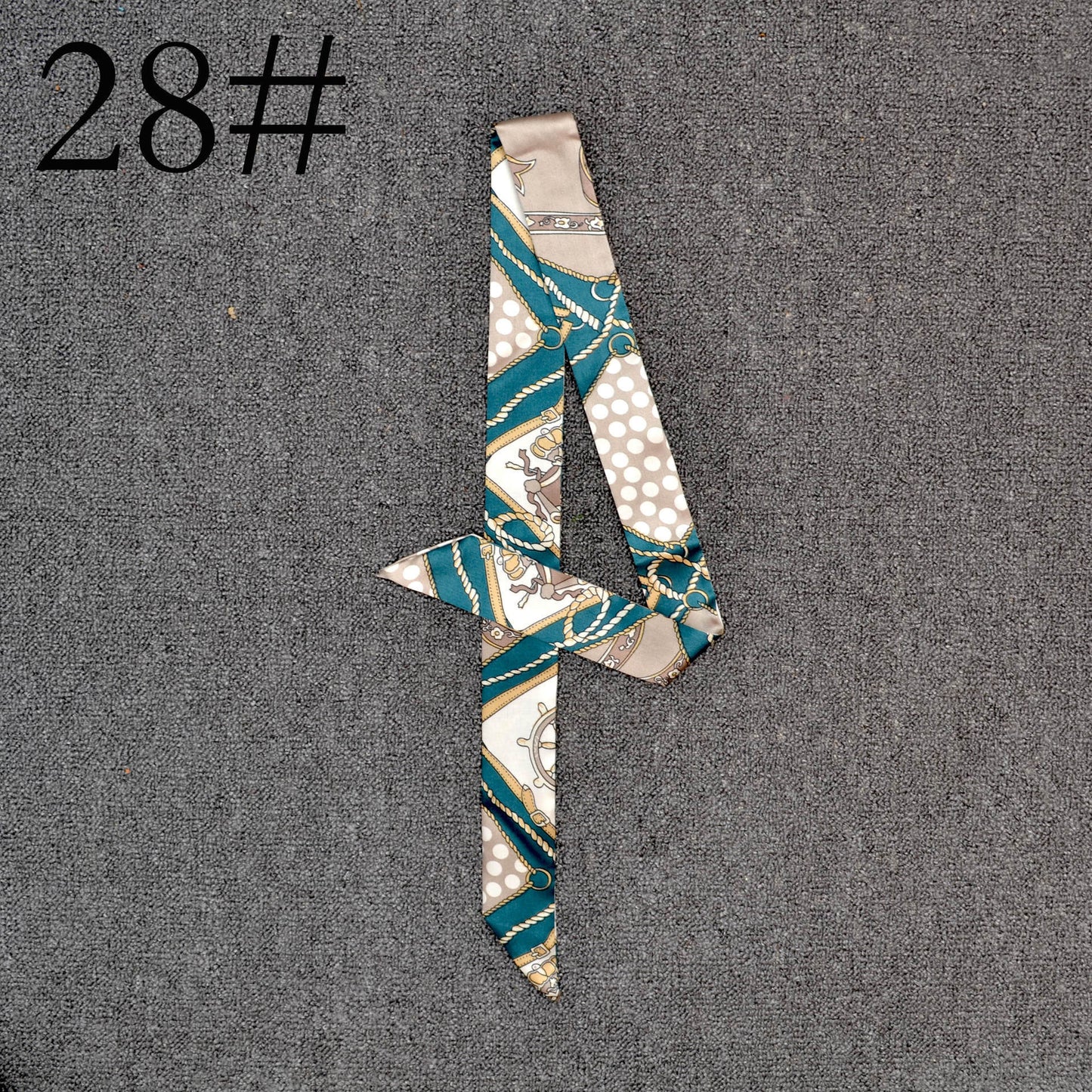 Long Scarf Tied With A Small Ribbon Wrapped Around The Handle Silk Scarf
