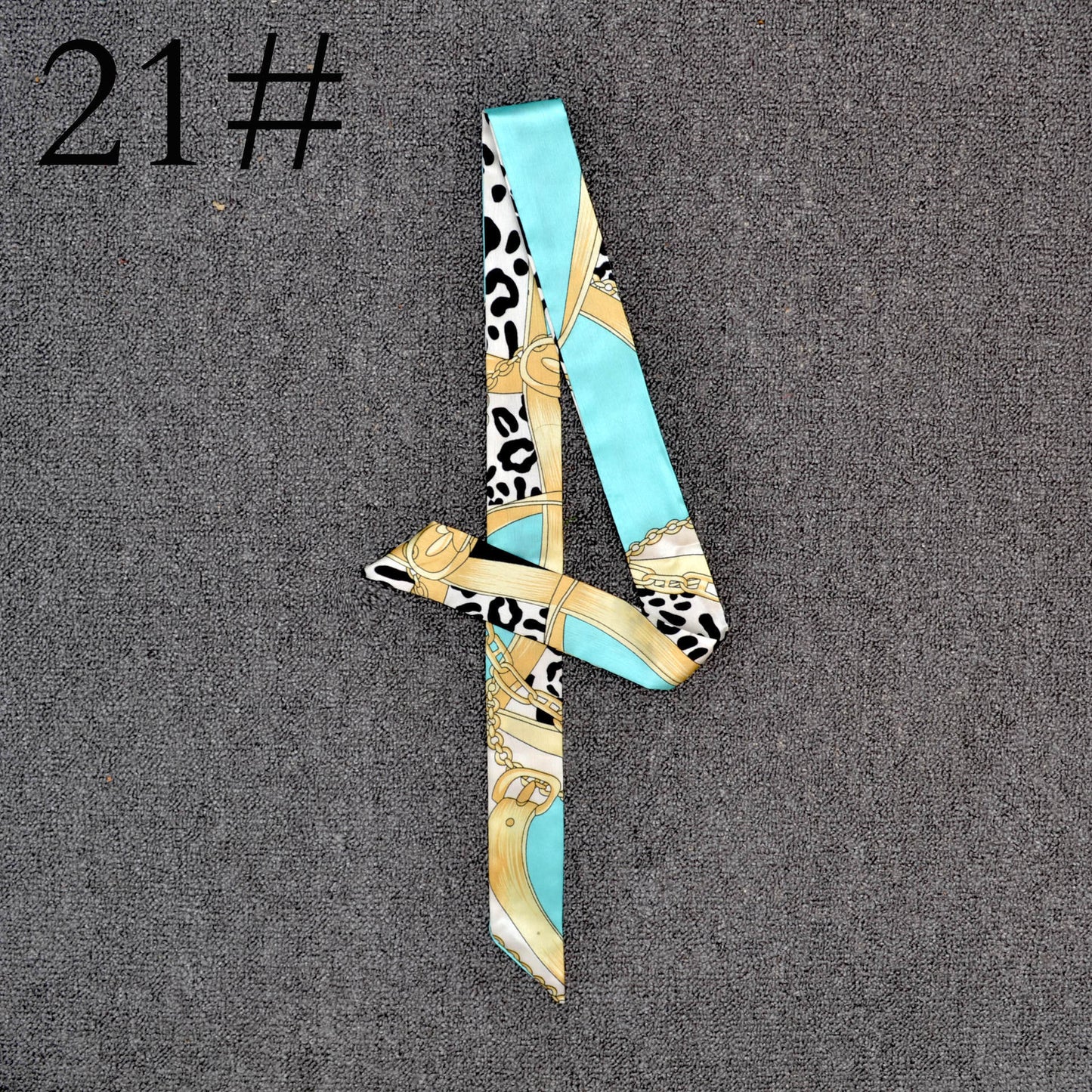 Long Scarf Tied With A Small Ribbon Wrapped Around The Handle Silk Scarf