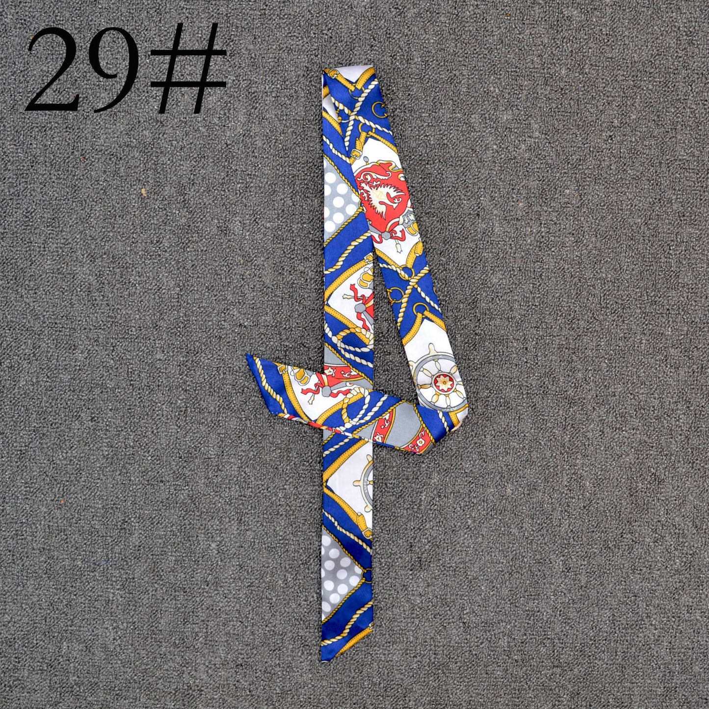 Long Scarf Tied With A Small Ribbon Wrapped Around The Handle Silk Scarf
