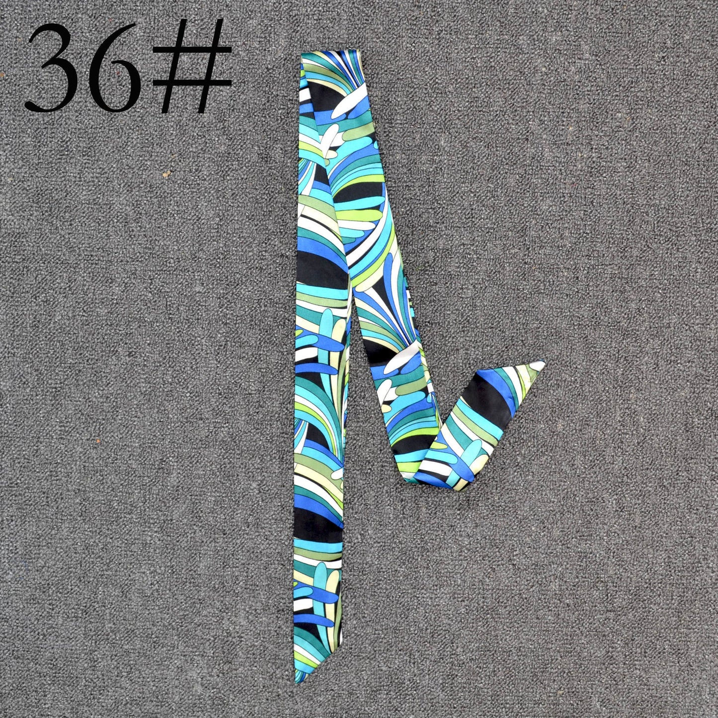 Long Scarf Tied With A Small Ribbon Wrapped Around The Handle Silk Scarf