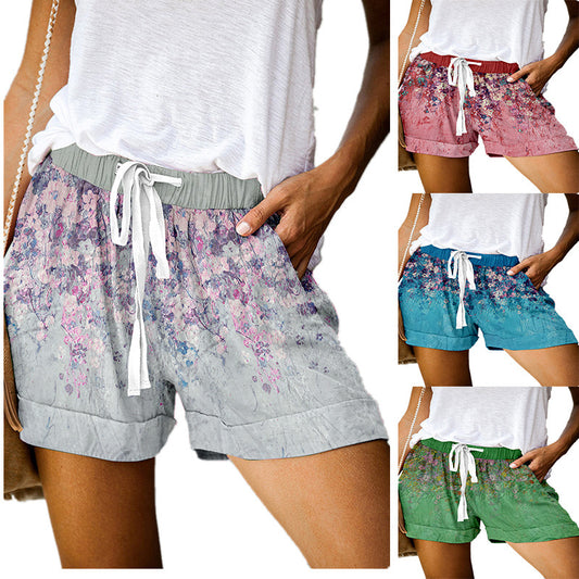 Positionering af casual shorts med snøre og brede ben til kvinder
