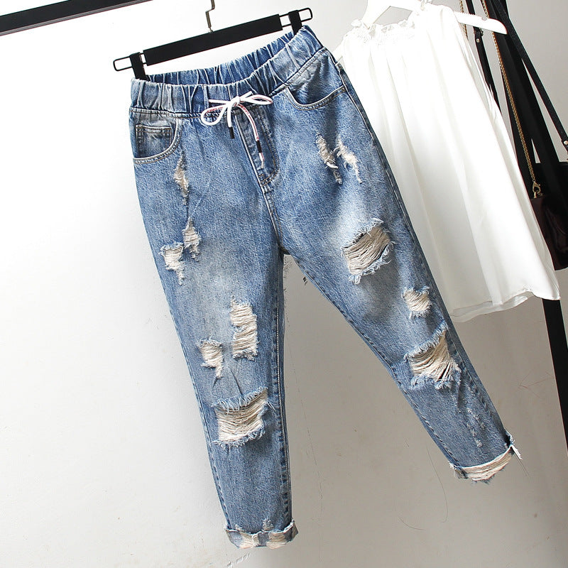 Oversized women's ripped jeans