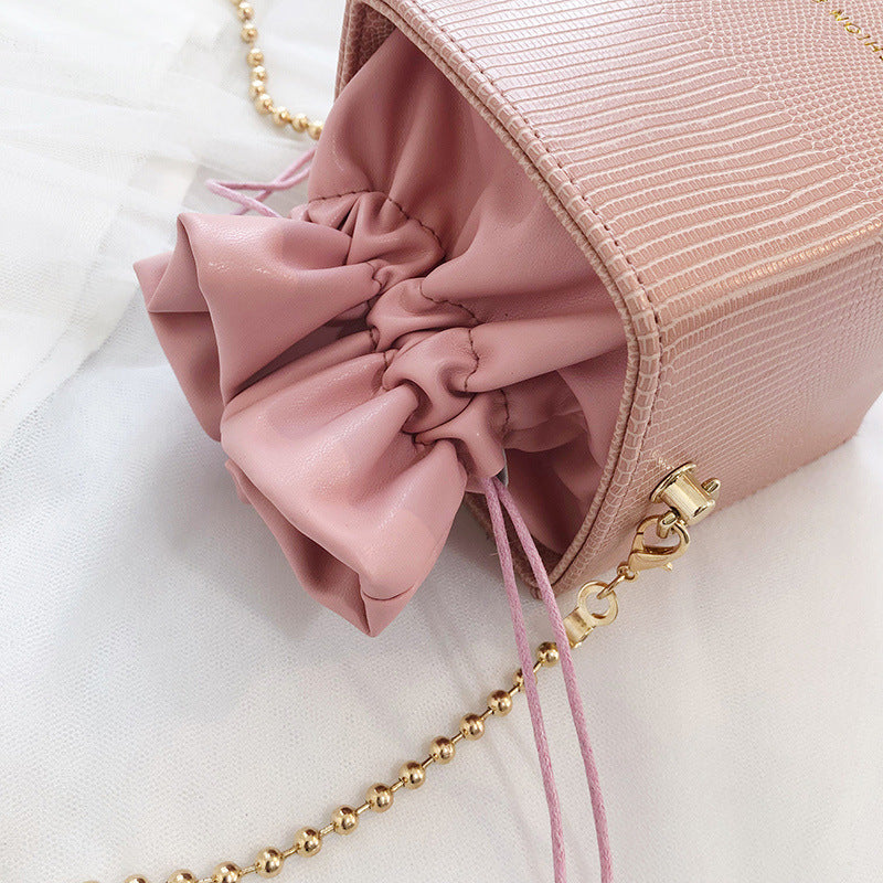 Chain drawstring crossbody bag