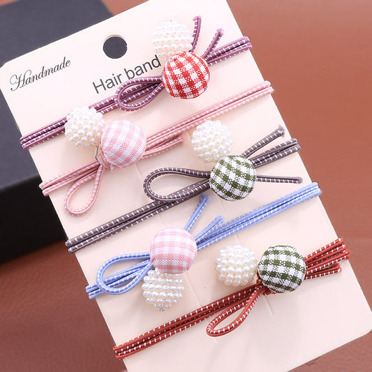 Hand-knotted gingham ball head rope
