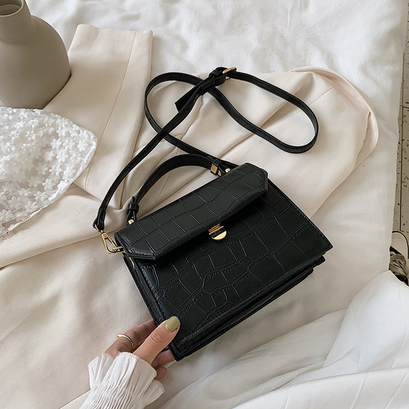 Stone embossed crossbody bag